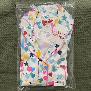 Roberta roller short sleeve top and bottom.